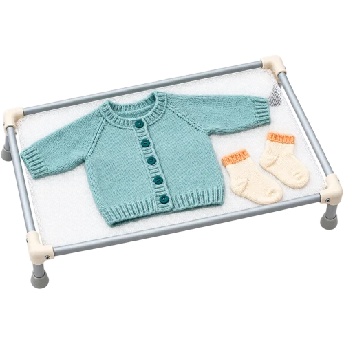 Melk, braaksel en ontlasting uit babykleding wassen